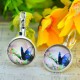 BOUCLE D OREILLES PAPILLON EN VERRE 