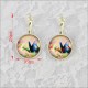 BOUCLE D OREILLES PAPILLON EN VERRE 