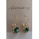 BOUCLES D OREILLES  EN STRASS TRANSPARENT ET PERLE VERTE PLAQUE OR